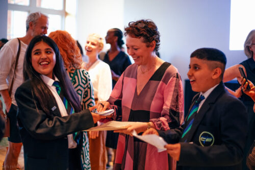 Olivia Colman with two students at Carlton Bolling College
