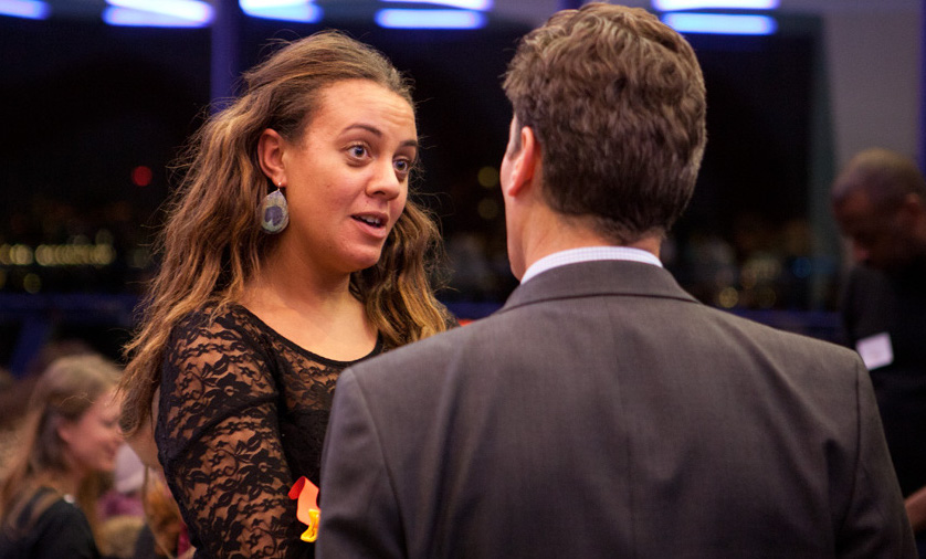 Two people talking at a City Hall event