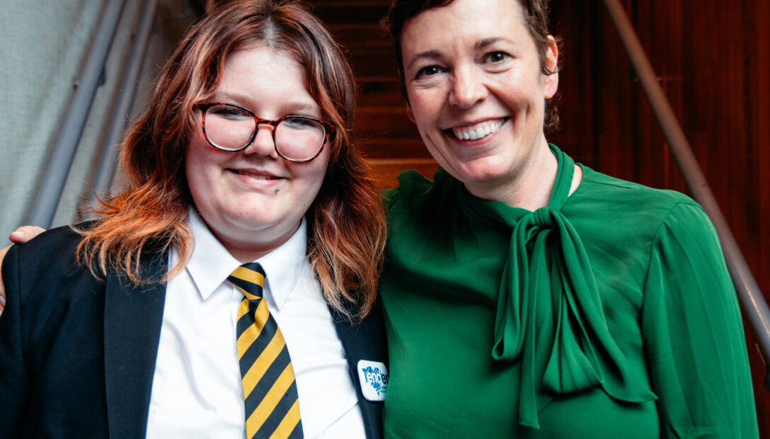 Olivia Colman and a student smiling together